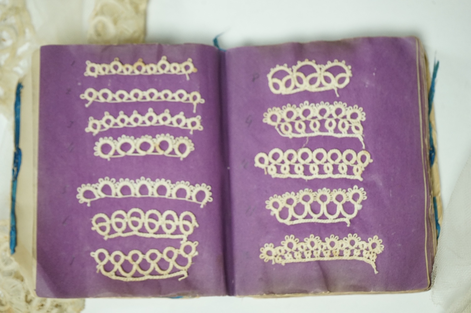 A Honiton lace wedding veil, (that has been cut into pieces), a Honiton edged collar, white worked jabot, various lace hankies etc. condition variable, very useful for theatre and film costume dramas.